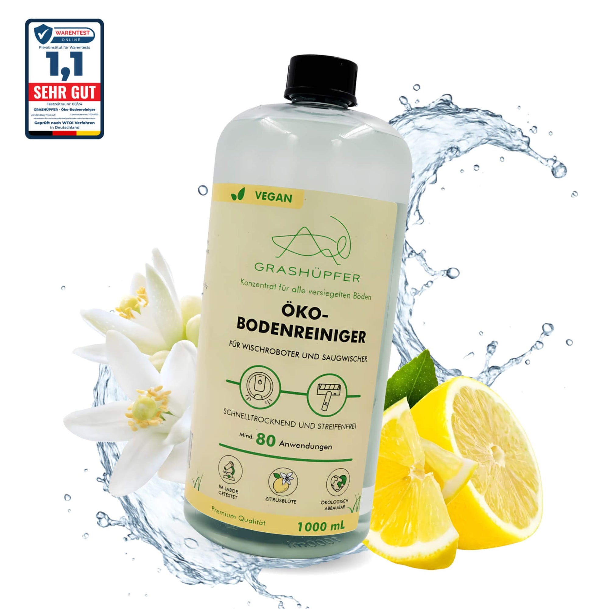 Der Grashüpfer Öko-Bodenreiniger mit Zitrusblüten-Duft steht in der Flasche vor der Zitrusblüte.