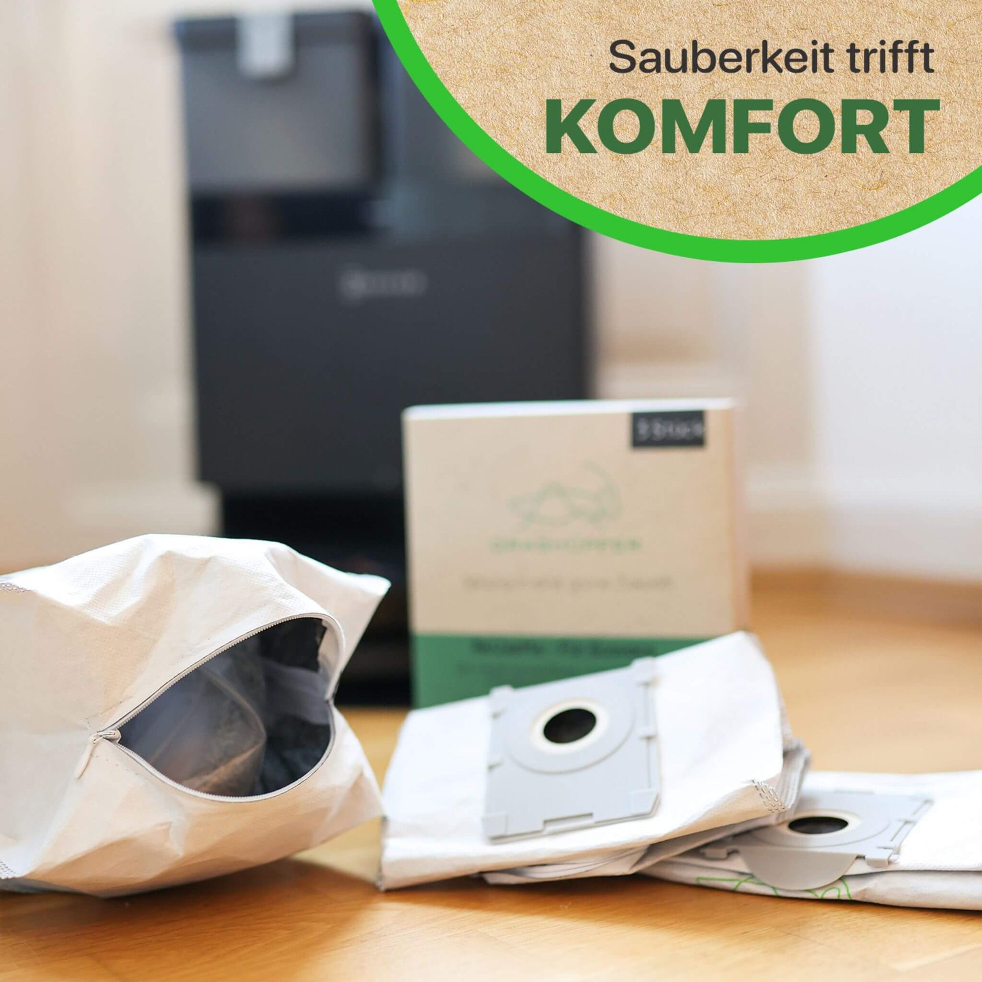 Grashüpfer ReuseMe Staubsaugerbeutel für ECOVACS Deebot mit Reißverschluss für einfache Entleerung, wiederverwendbar und nachhaltig, kompatibel mit Auto-Entleerungsstation, Set mit Box im Hintergrund.